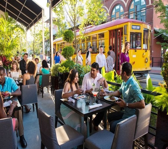 People dining on an outside patio in Little Rock